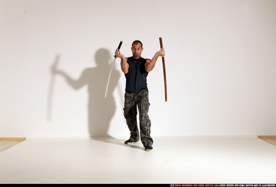 Man Adult Athletic White Fighting with sword Moving poses Casual