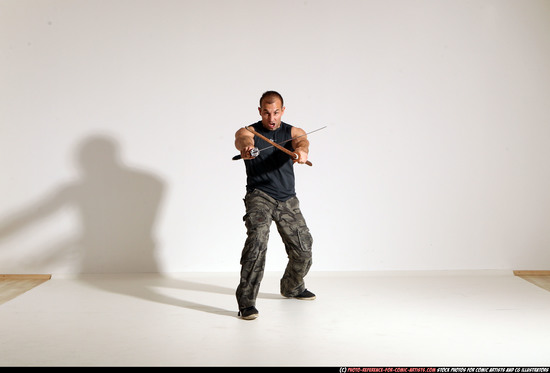 Man Adult Athletic White Fighting with sword Moving poses Casual