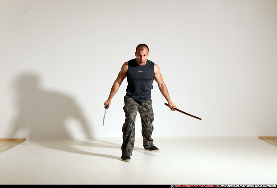 Man Adult Athletic White Fighting with sword Moving poses Casual