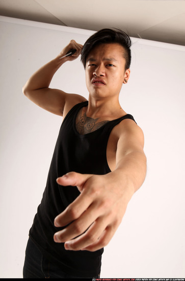 Man Young Athletic Fighting with knife Standing poses Casual Asian