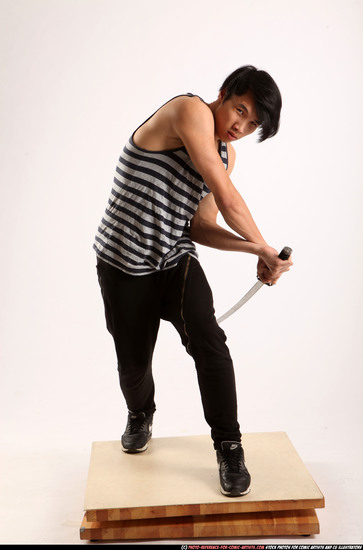 Man Young Athletic Fighting with sword Standing poses Casual Asian