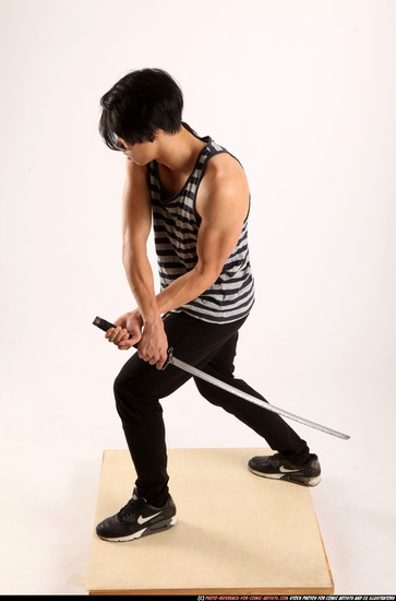 Man Young Athletic Fighting with sword Standing poses Casual Asian