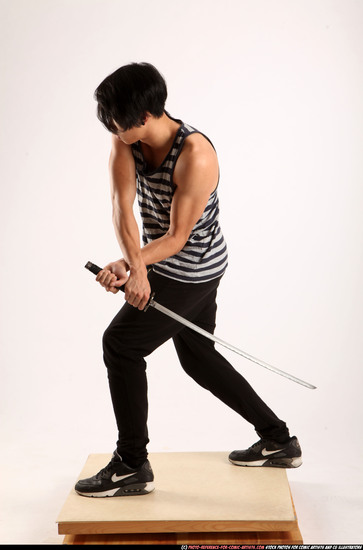 Man Young Athletic Fighting with sword Standing poses Casual Asian