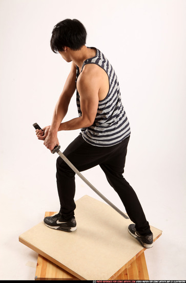 Man Young Athletic Fighting with sword Standing poses Casual Asian