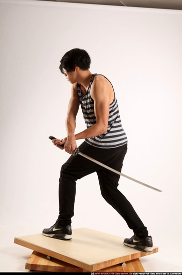 Man Young Athletic Fighting with sword Standing poses Casual Asian