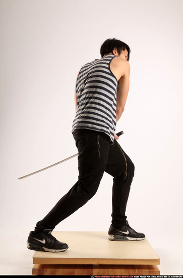 Man Young Athletic Fighting with sword Standing poses Casual Asian