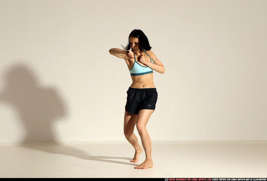 Woman Young Athletic White Fighting with knife Moving poses Casual