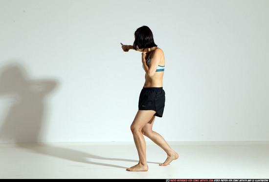 Woman Young Athletic White Fighting with knife Moving poses Casual