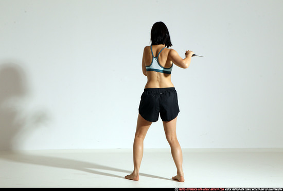 Woman Young Athletic White Fighting with knife Moving poses Casual