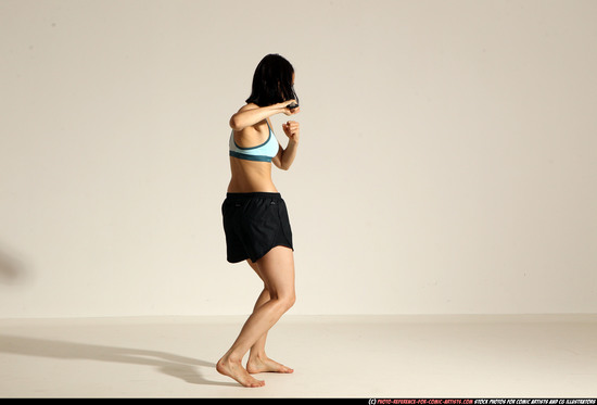 Woman Young Athletic White Fighting with knife Moving poses Casual