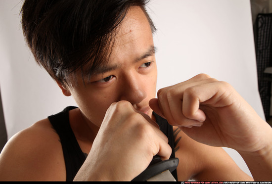 Man Young Athletic Fighting with knife Standing poses Casual Asian