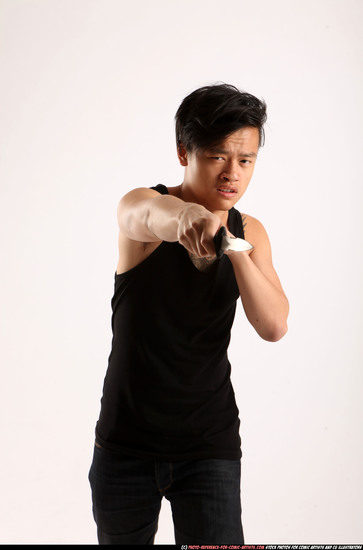 Man Young Athletic Fighting with knife Standing poses Casual Asian