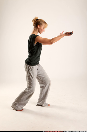 Woman Adult Athletic White Fighting with sword Standing poses Casual