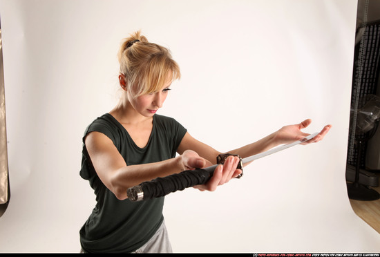 Woman Adult Athletic White Fighting with sword Standing poses Casual