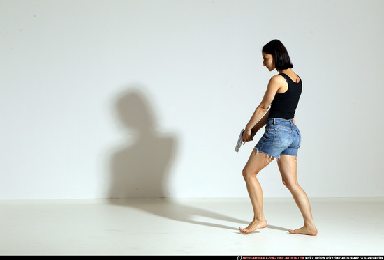 Woman Young Athletic White Fighting with gun Moving poses Casual