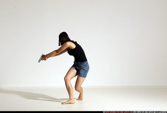 Woman Young Athletic White Fighting with gun Moving poses Casual