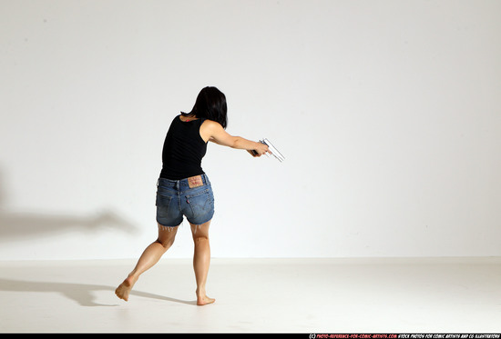 Woman Young Athletic White Fighting with gun Moving poses Casual