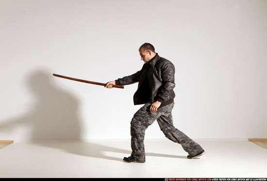 Man Adult Athletic White Fighting with sword Moving poses Casual