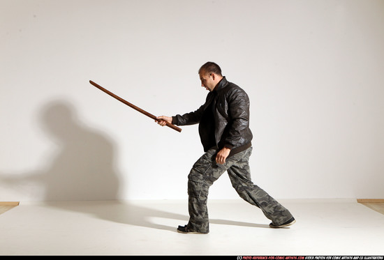 Man Adult Athletic White Fighting with sword Moving poses Casual