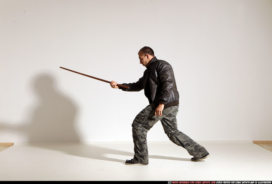 Man Adult Athletic White Fighting with sword Moving poses Casual