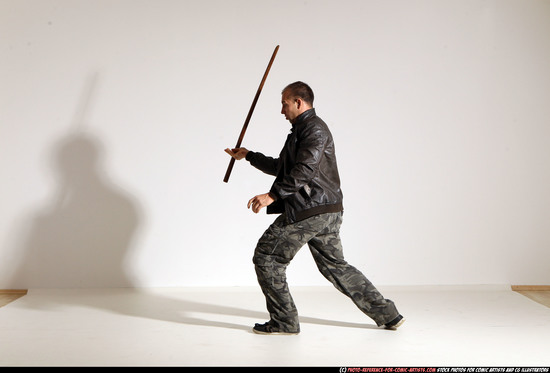 Man Adult Athletic White Fighting with sword Moving poses Casual