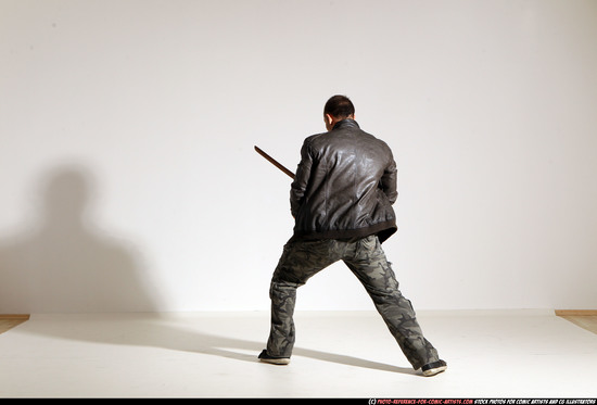 Man Adult Athletic White Fighting with sword Moving poses Casual