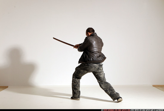 Man Adult Athletic White Fighting with sword Moving poses Casual