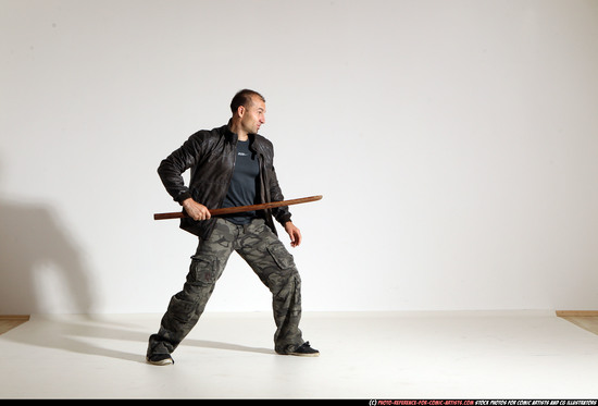 Man Adult Athletic White Fighting with sword Moving poses Casual