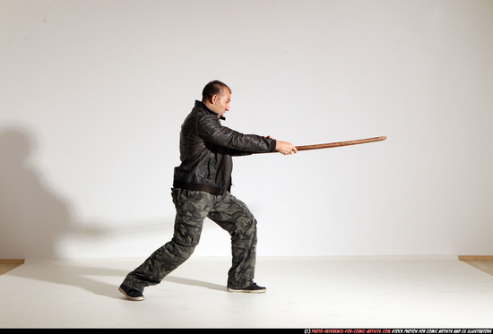 Man Adult Athletic White Fighting with sword Moving poses Casual