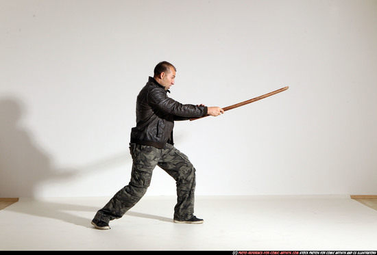 Man Adult Athletic White Fighting with sword Moving poses Casual