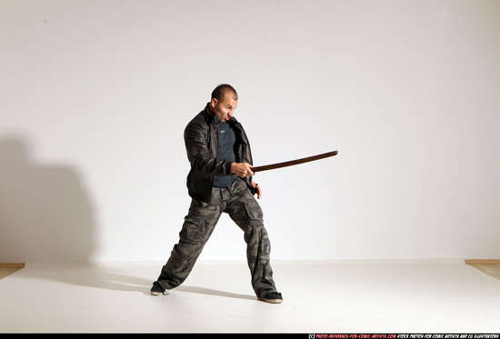 Man Adult Athletic White Fighting with sword Moving poses Casual