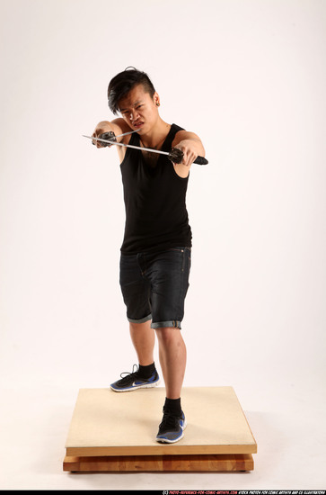 Man Young Athletic Fighting with sword Standing poses Casual Asian