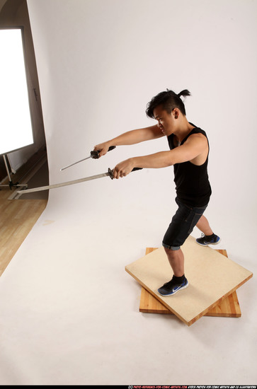 Man Young Athletic Fighting with sword Standing poses Casual Asian