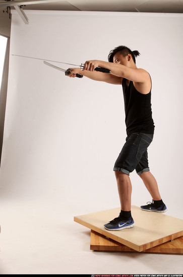 Man Young Athletic Fighting with sword Standing poses Casual Asian