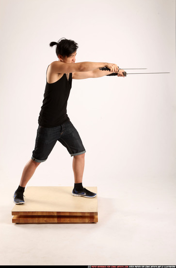 Man Young Athletic Fighting with sword Standing poses Casual Asian