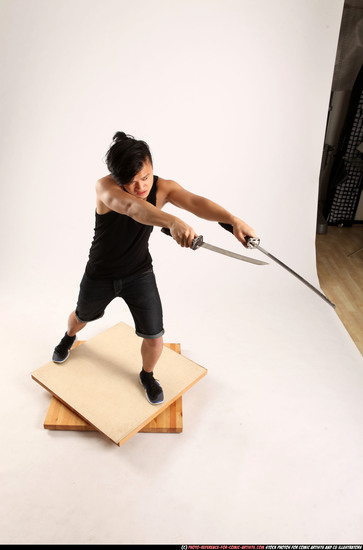 Man Young Athletic Fighting with sword Standing poses Casual Asian