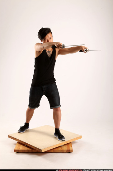 Man Young Athletic Fighting with sword Standing poses Casual Asian