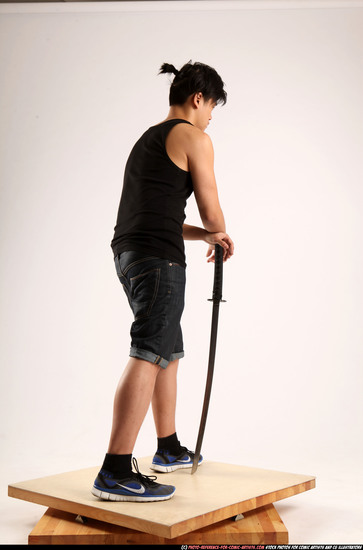 Man Young Athletic Fighting with sword Standing poses Casual Asian