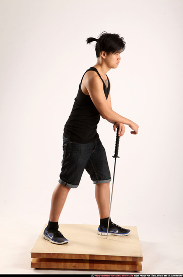 Man Young Athletic Fighting with sword Standing poses Casual Asian