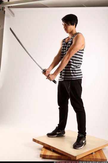 Man Young Athletic Fighting with sword Standing poses Casual Asian