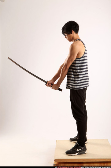 Man Young Athletic Fighting with sword Standing poses Casual Asian