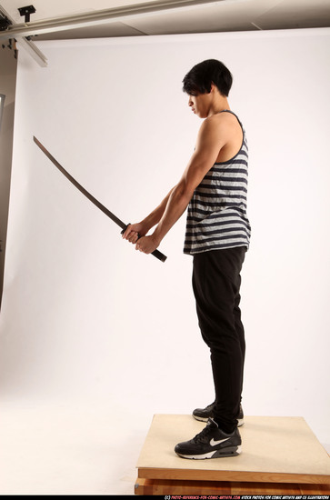 Man Young Athletic Fighting with sword Standing poses Casual Asian