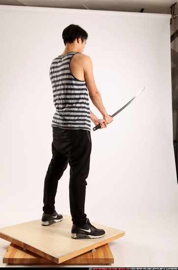 Man Young Athletic Fighting with sword Standing poses Casual Asian