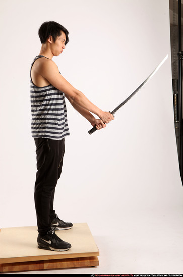 Man Young Athletic Fighting with sword Standing poses Casual Asian