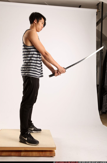 Man Young Athletic Fighting with sword Standing poses Casual Asian