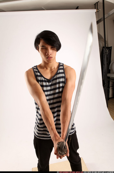 Man Young Athletic Fighting with sword Standing poses Casual Asian