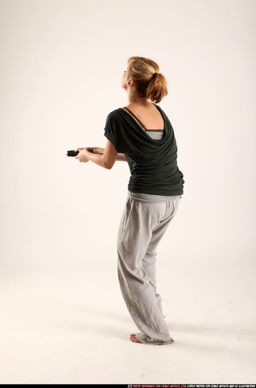 Woman Adult Athletic White Fighting with sword Moving poses Casual