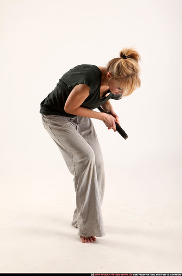 Woman Adult Athletic White Fighting with sword Moving poses Casual