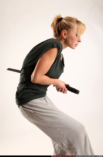 Woman Adult Athletic White Fighting with sword Moving poses Casual