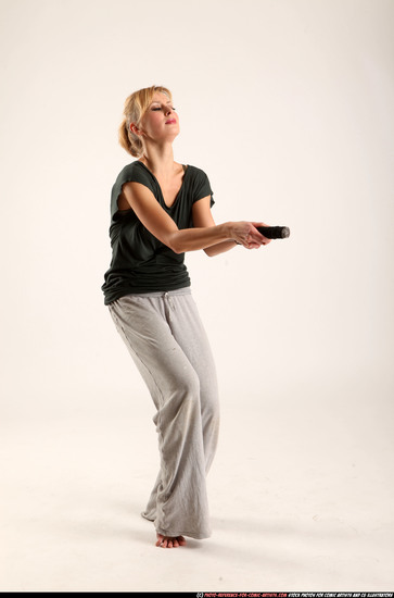 Woman Adult Athletic White Fighting with sword Moving poses Casual